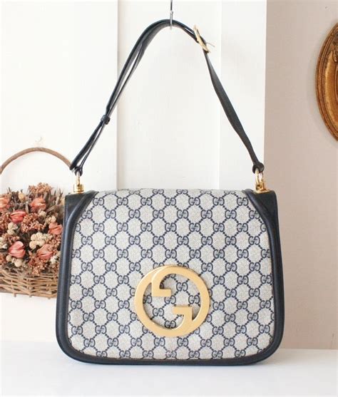 gucci marroni logo scamosciato|real gucci handbags.